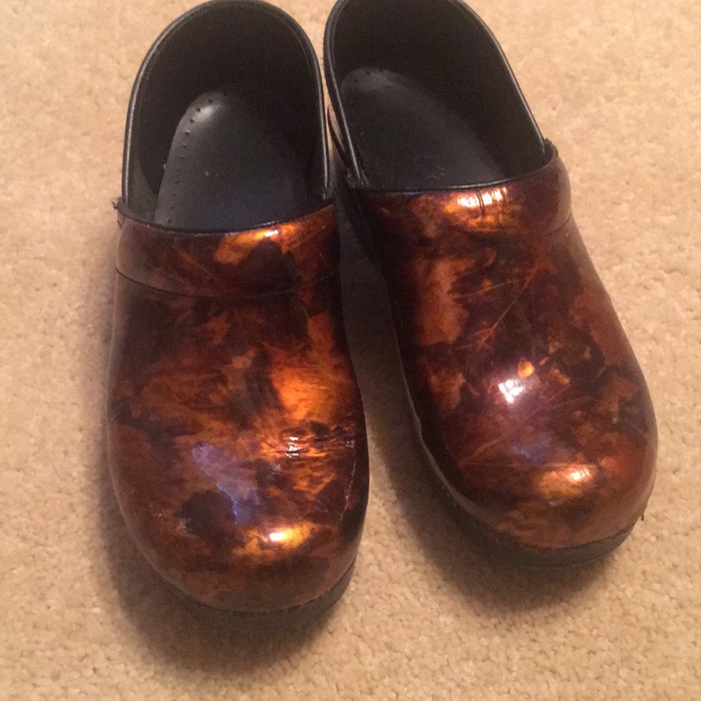 Dansko brown and gold color clog